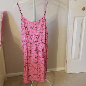 A pink dress with zebra prints all over.